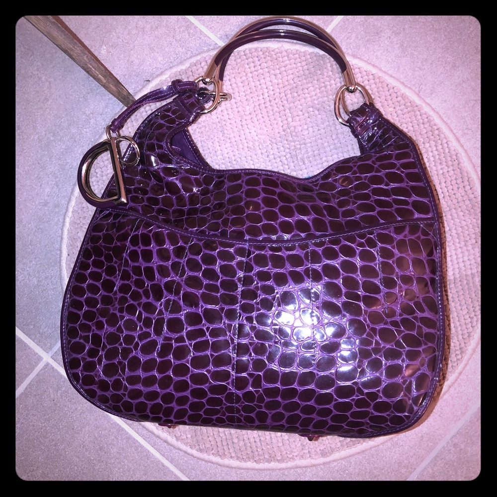 Dior purple leather bag.